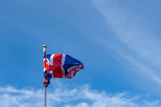 istock Union Jack flag flying in the breeze 1970854714