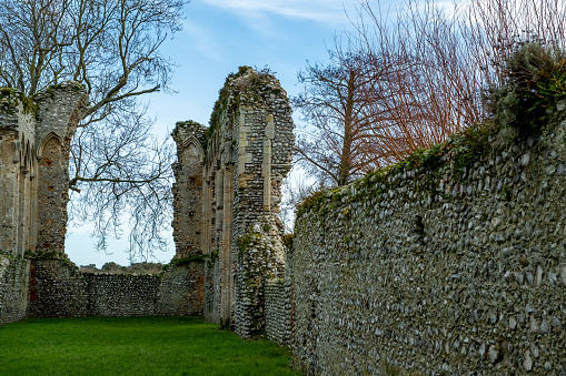 The ancient and abandoned ruins of Beeston Regis priory in the Norfolk countryside