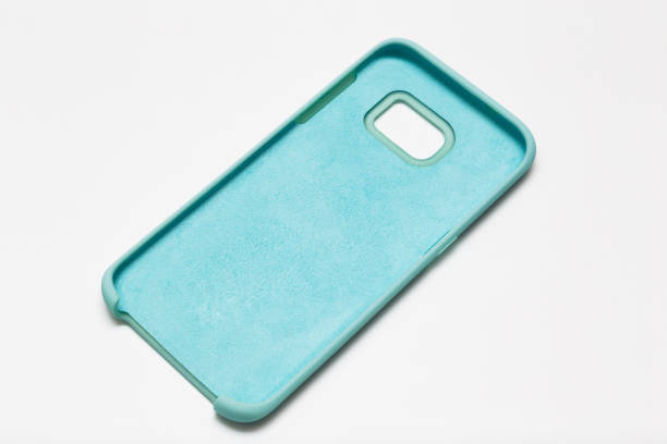 istock Beautiful soft pastel mint color mobile phone case isolated on white background 1970889895