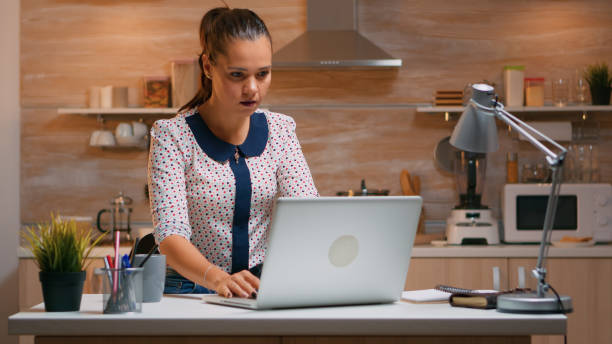istock Business woman working from home using laptop 1970899381