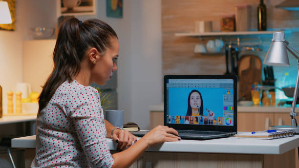 istock Retoucher working on laptop with photo editing software 1970900962