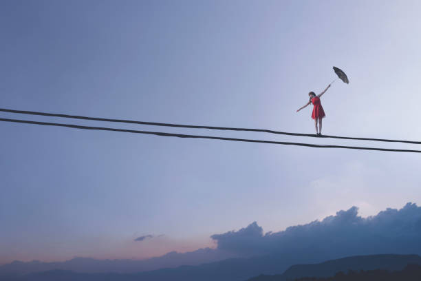 380+ Tightrope Walker Woman Stock Photos, Pictures & Royalty-Free Images -  iStock
