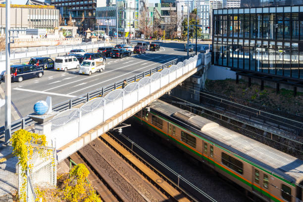 Tokyo, Japan. January 8, 2024. a train crosses an underground railway section in the city center