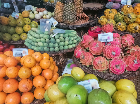 View of a traditional counter with various types of fruit, typically located in the traditional market...
