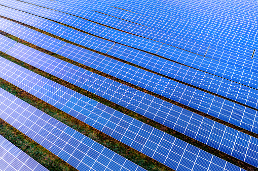 a modern solar park from above in the sun