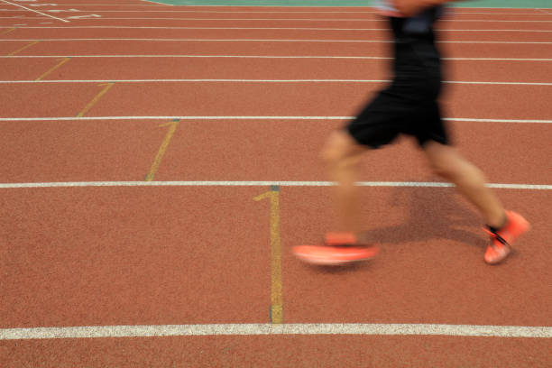 istock Long distance runners are running on the track 1971121692