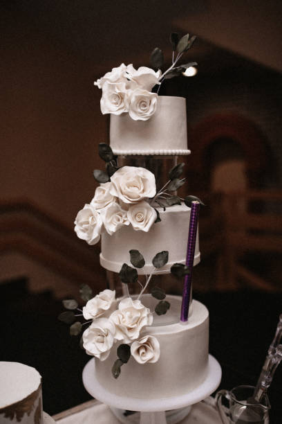istock Elegant wedding cake with white flowers 1971205331