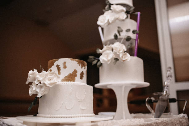 istock Elegant wedding cake with white flowers 1971205334
