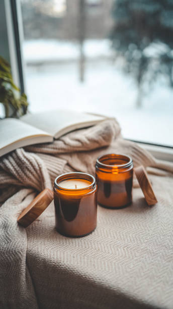 istock Burning candle in a cozy home interior 1971206368