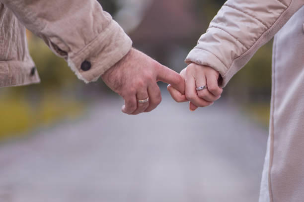 istock Bride and groom holding hands 1971206888