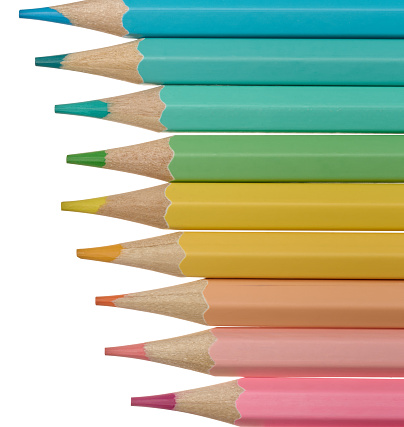 Multi-colored wooden pencils on a white background