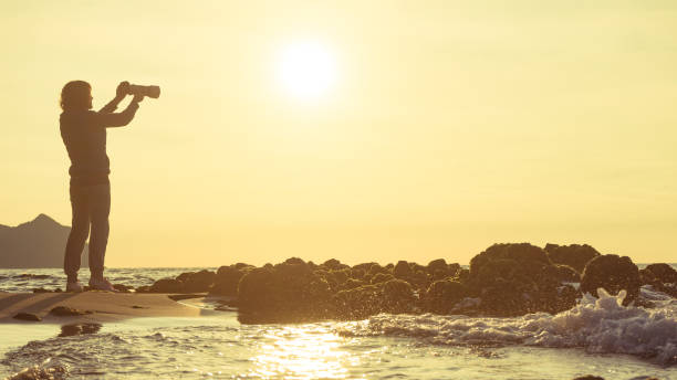 istock Woman with camera on Monsul beach, Spain 1971229250