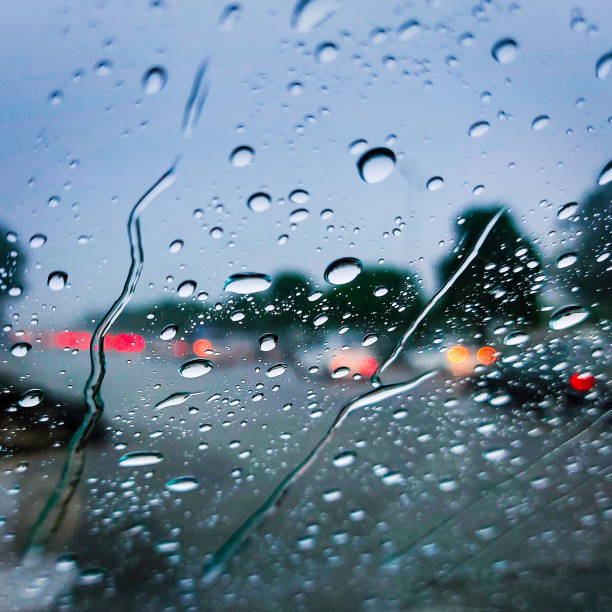 istock The image depicts a window with raindrops on it. 1971256154