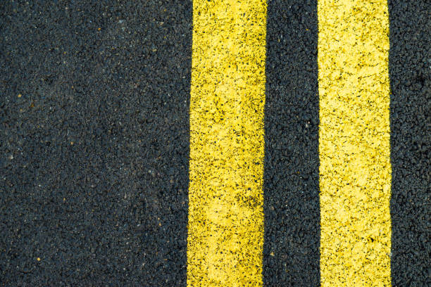 istock Asphalt road with yellow line marks 1971306641