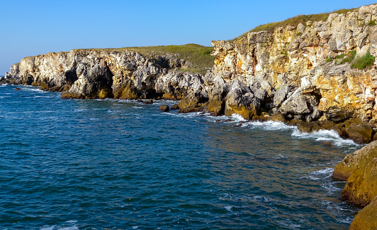 Seascape on the Black Sea, Vysoky Steep stone coast with inaccessible rocks near the village of Tyulenovo, Bulgaria