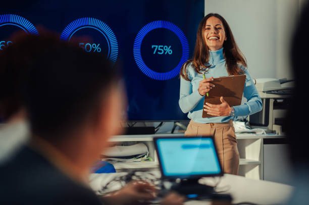 istock Smiling caucasian woman talking about company projects during a meeting 1971347146