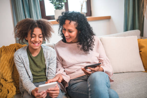 istock E-Reader Bonding in a Domestic Living Room 1971389325