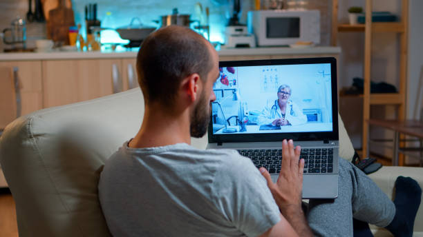 istock Physician doctor consulting online patient during coronavirus quarantine 1971404422