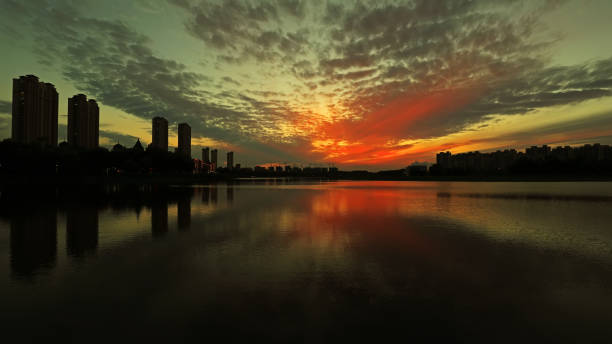 istock Evening scenery of waterfront city, North China 1971427599