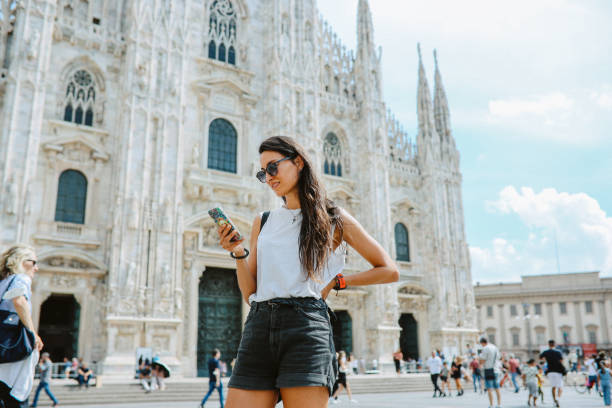 istock checking maps on smartphone in Milan, Italy 1971432957