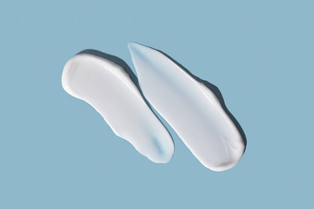 istock Cosmetic smear, cream texture on a blue background. Skin care. 1971462829