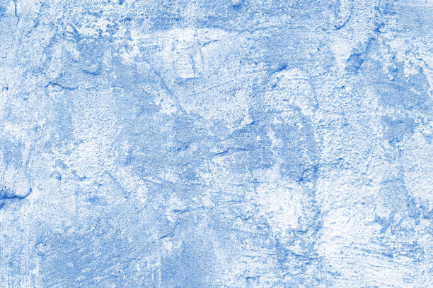 istock Stucco plaster surface background texture of blue and white painted cement, concrete wall 1971480072