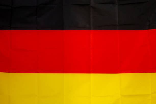 German flag with fabric texture background. National flag of Germany