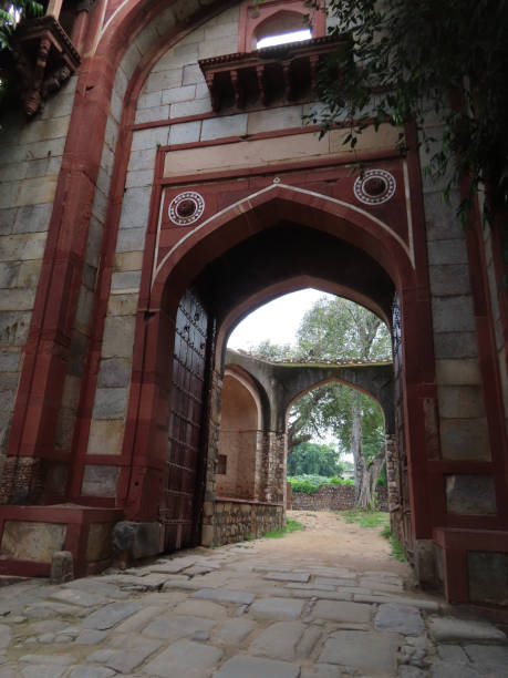 istock India, Delhi, ancient mausoleum in a tropical park 1971484409