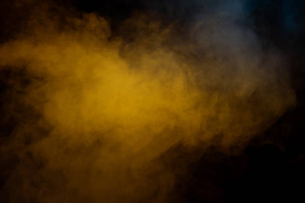 istock Blue and yellow steam on a black background. 1971519393