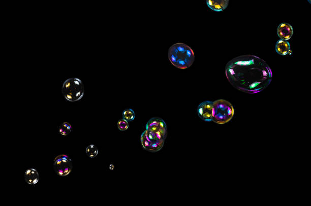 istock Soap bubbles isolated on a black background 1971519442