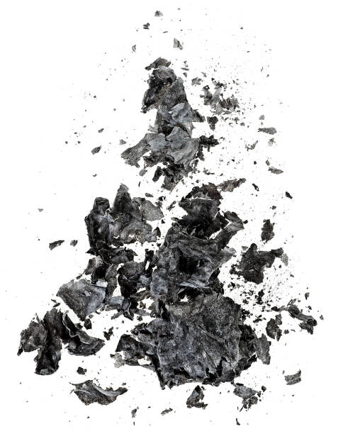 istock Burnt and charred paper isolated on a white background, view from above. 1971520560