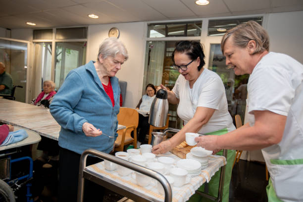 istock Senior women getting her first morning coffee in a nursing home 1971533574