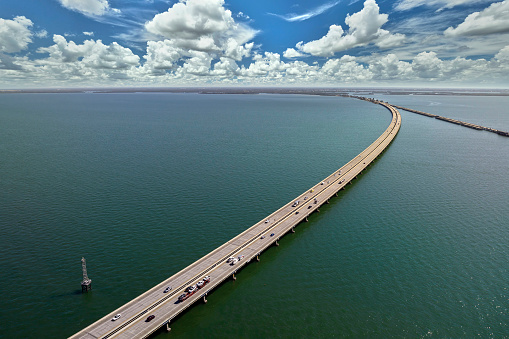 Sunshine Skyway Bridge over Tampa Bay in Florida with moving traffic. Concept of transportation infrastructure.