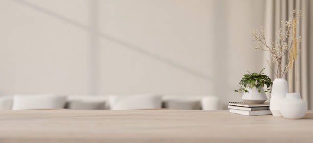 istock Copy space for displaying your product on a minimalist wood table in a minimalist white living room. 1971559585