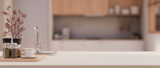 istock A copy space on a modern, white kitchen island in a modern kitchen. 1971560107