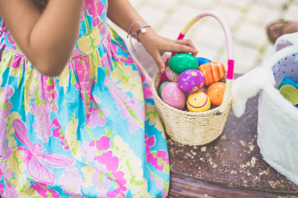 Girls dressed for Easter at an egg hunt