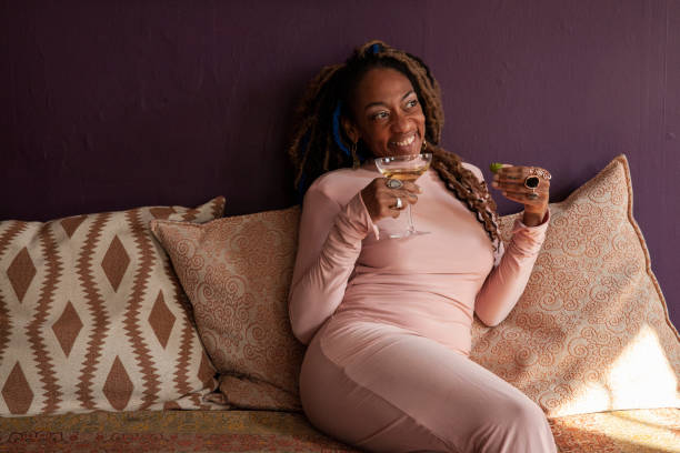 istock Woman Drinking Champagne and Smiling 1971672233