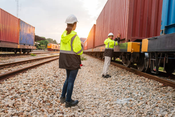 istock Team of engineer railway wearing safety uniform and helmet under checking train ,wheels and control system for safety transportation. Maintenance cycle concept. 1971778737