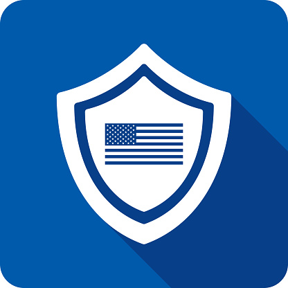 Vector illustration of a shield with USA flag icon against a blue background in flat style.