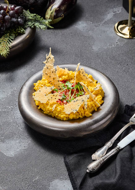 istock Milanese risotto with beef tartare and Parmesan crisps, aesthetically pleasing and elegant 1971823021