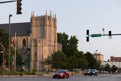 Sunset view of a historic church in Midtown Kansas City, Missouri, USA.