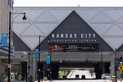 Kansas City, Missouri, USA - June 15, 2023:  Traffic passes in front of the Kansas City Convention Center.