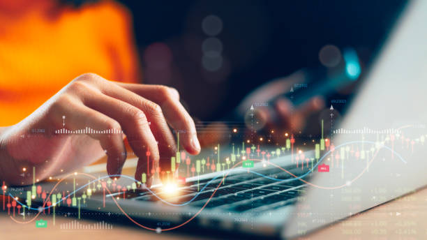 istock Businesswoman analyzing stock market graph data with financial graph, business growth with the market report, currency exchange. Stock market data analysis, Business, finance, and investment concepts. 1971871663