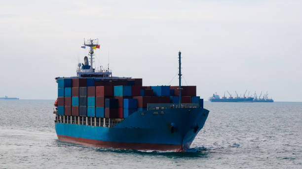 istock logistic cargo container ship sailing in sea to import export goods and distributing products to dealer and consumers across worldwide, aerial front view 1971911953