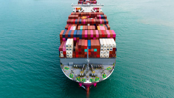 istock logistic cargo container ship sailing in sea to import export goods and distributing products to dealer and consumers across worldwide, aerial front view 1971916190