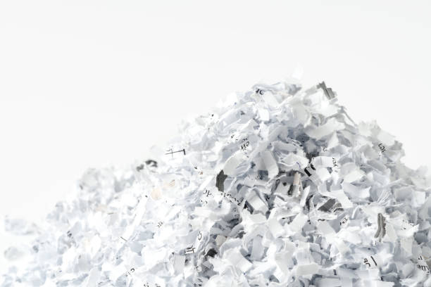 istock Shredded paper on white background close up 1971920807