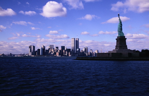 Manhattan Skyline with the Statue of Liberty and World Trade Center Twin Towers in New York City in early 1990s