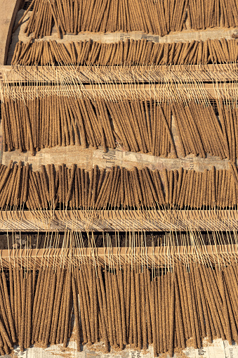 Traditionl Balinese incense sticks drying in the sun
