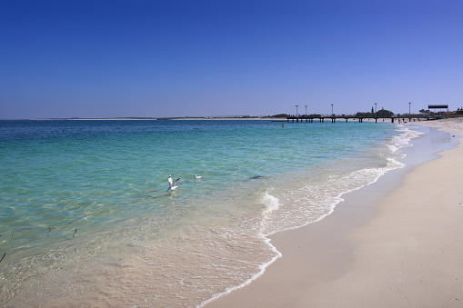Pictures of and near the curved jetty at Jurien Bay, showing off the white beaches, turquoise colored sea and general beauty of the location