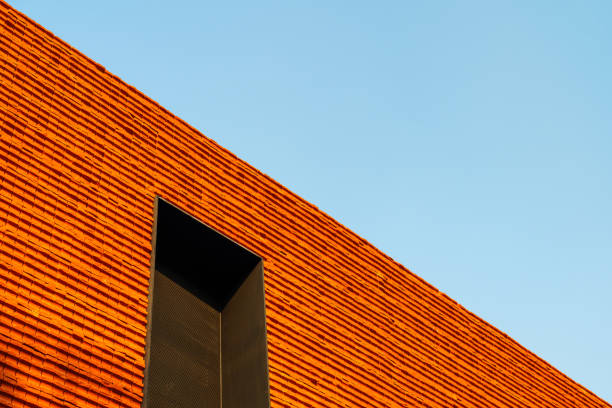 These are some buildings made of brick and concrete in an art district in Beijing. The art district is an abandoned industry factory turned into creative center.